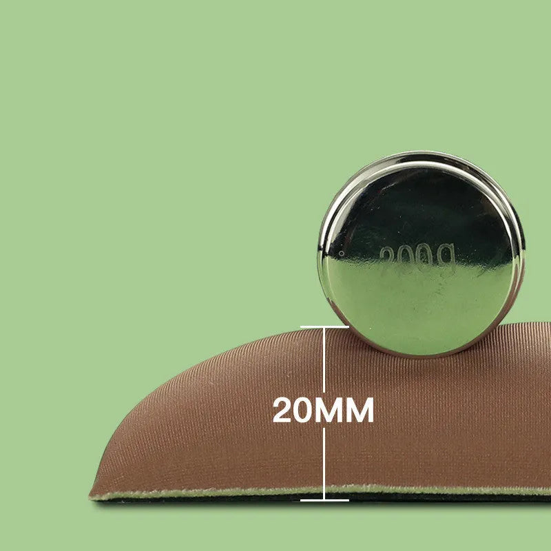 Green kiwi fruit shaped mouse pad with integrated soft wrist support cushion on a desk.