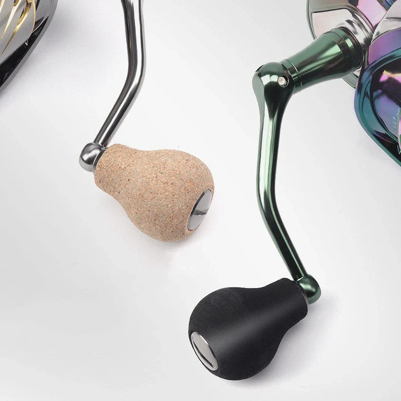 All-metal spinning fishing reel with stainless steel bearings for saltwater use, showing interchangeable handle