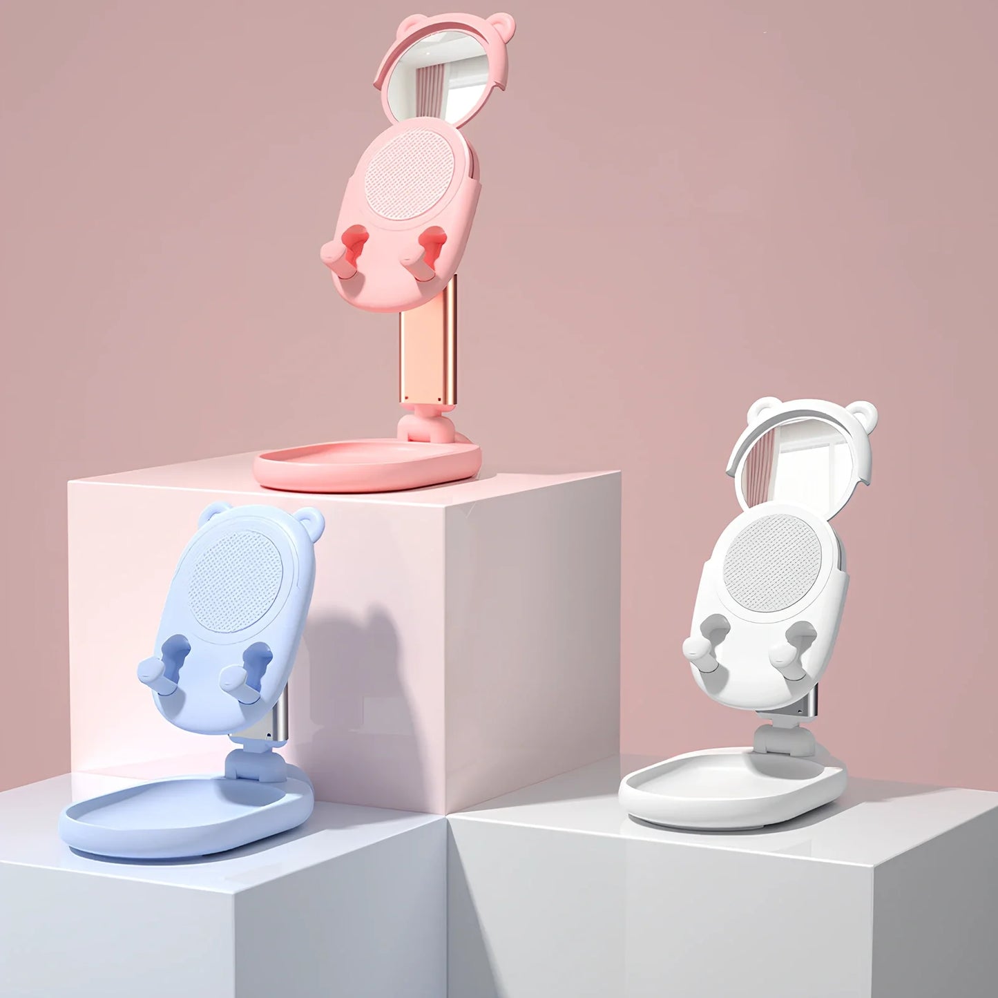 Adjustable desk phone stand with mirror holding iPad, showing 360-degree rotation capability