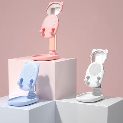 Adjustable desk phone stand with mirror holding iPad, showing 360-degree rotation capability