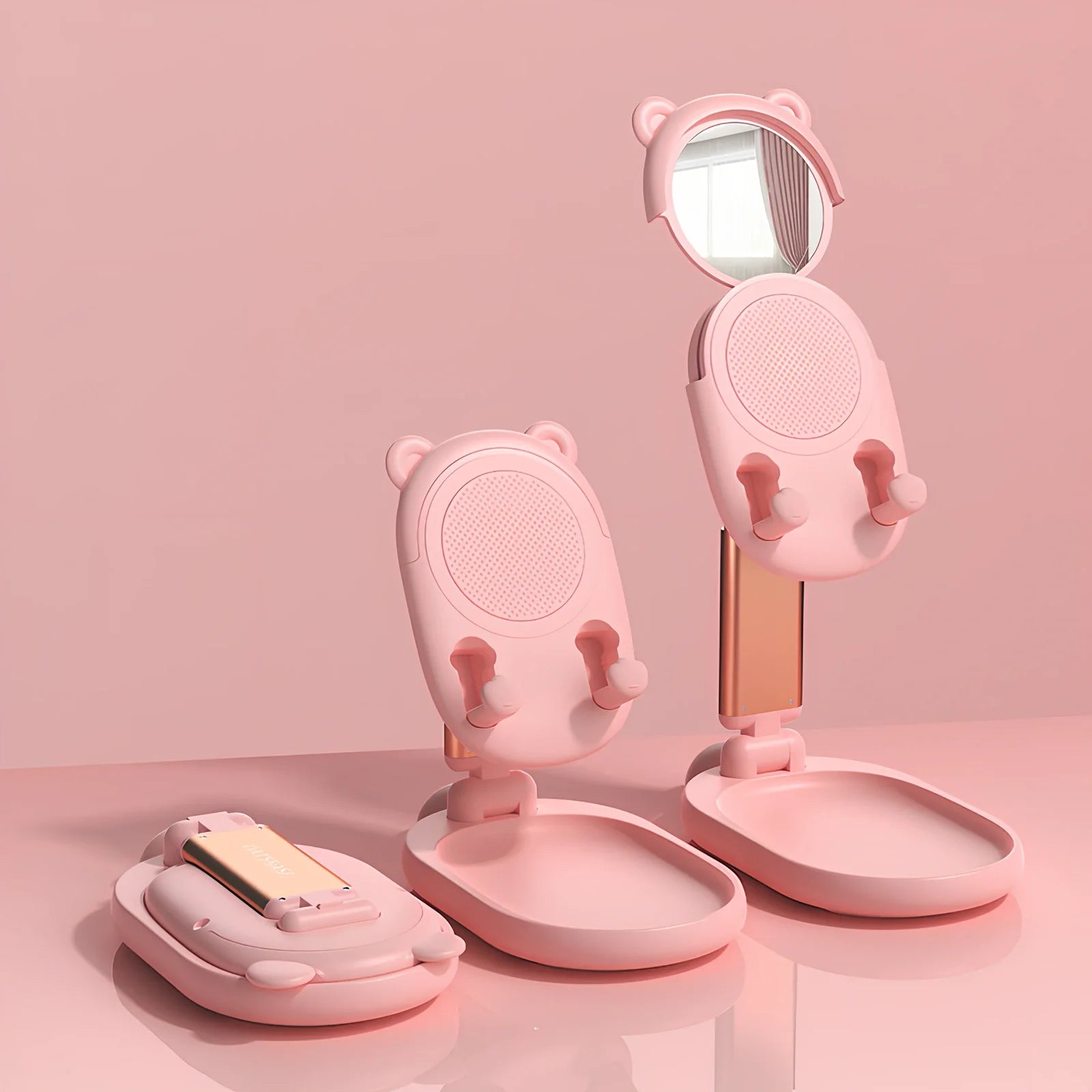 Adjustable desk phone stand with mirror holding iPad, showing 360-degree rotation capability