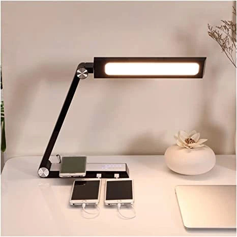 Adjustable LED desk lamp with wireless charging in white and black options