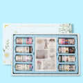 100 rolls of antique character and colourful paper tape in a storage box with multiple width options
