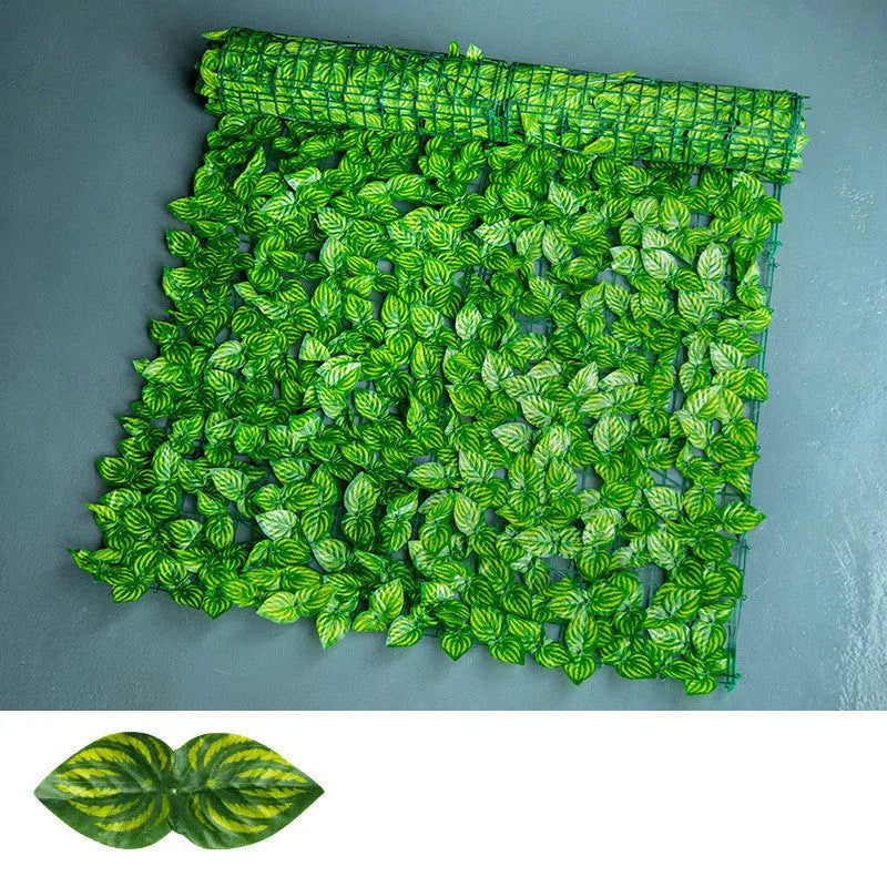 Green artificial plastic fence net with colour-printed radish leaves, shown in watermelon and apple leaf patterns.