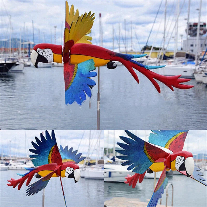 Parrot-themed garden windmill decoration with vibrant colours, spinning in the breeze