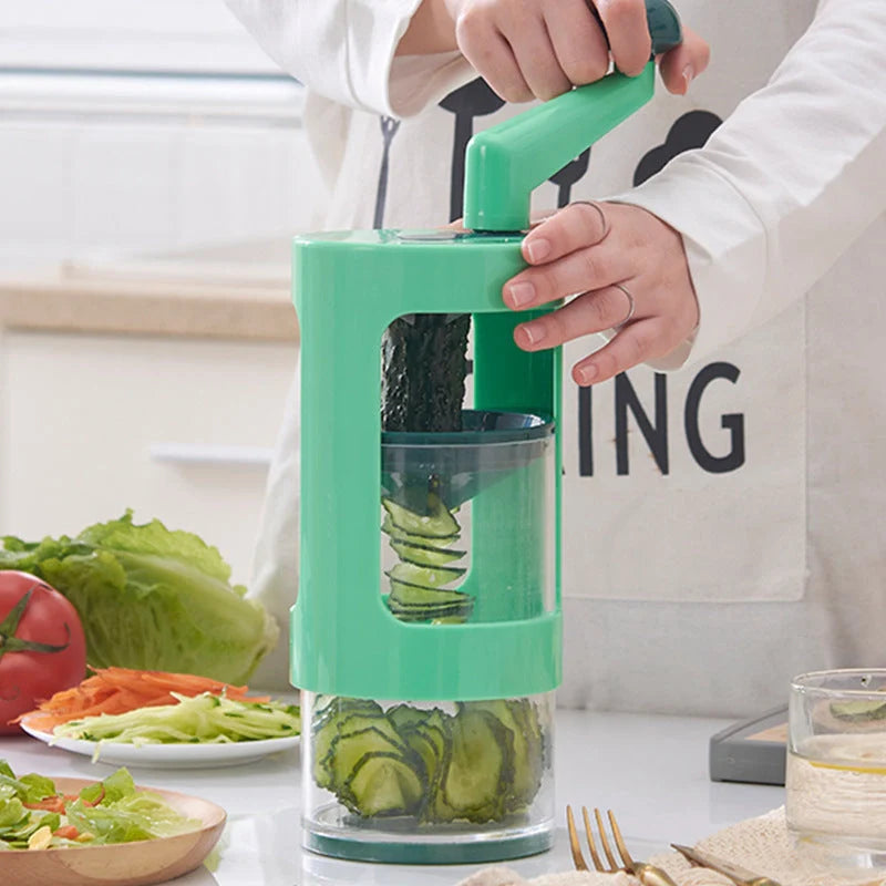 Green multifunctional vegetable shredder with stainless steel blade for efficient kitchen prep