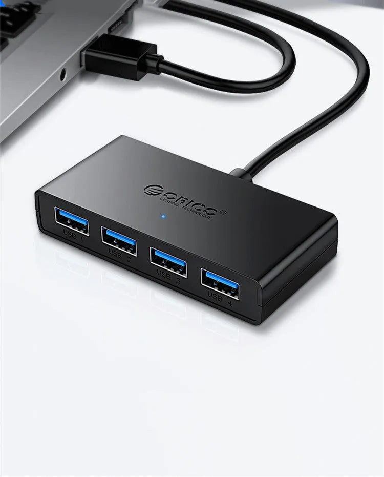 ORICO G11-H4 USB 3.0 hub with four ports and auxiliary Micro USB power port in black finish