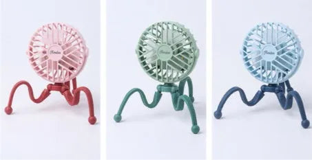 Cute animal design mini stroller fan with LED night light and flexible clip in pink on a stroller
