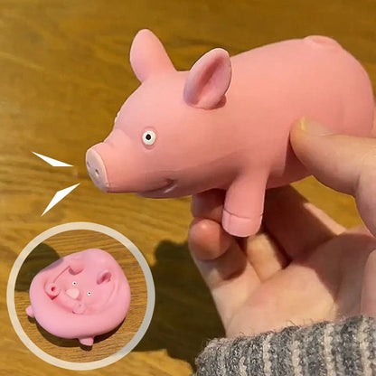 Stretchable pink pig-shaped stress relief toy made from soft TPR rubber