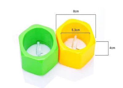 Yellow or green ABS plastic spiral vegetable cutter for creating julienne strips from cucumbers