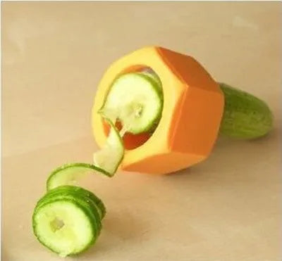Yellow or green ABS plastic spiral vegetable cutter for creating julienne strips from cucumbers