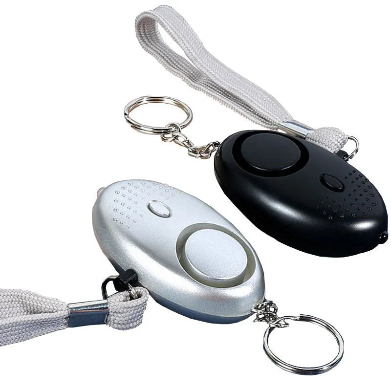 Personal safety alarm with LED light in multiple colour options