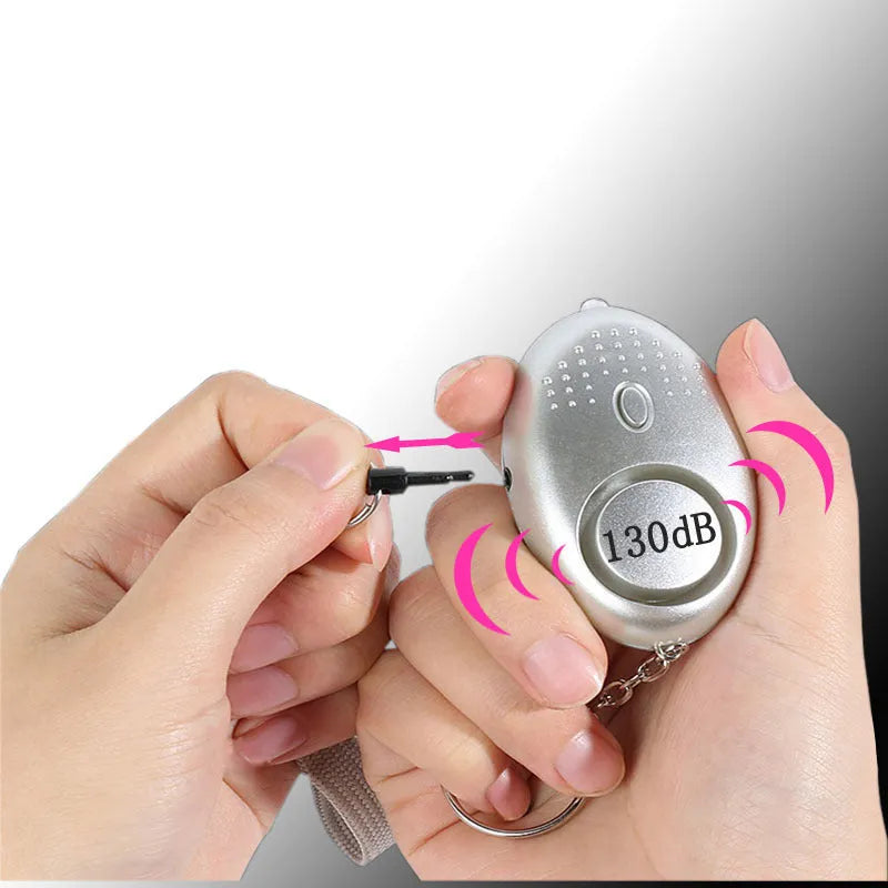 Personal safety alarm with LED light in multiple colour options