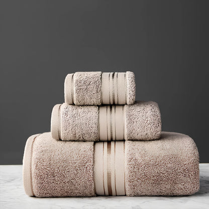 Three-piece cotton bath towel set in blue, featuring 70x150cm bath towel, 34x75cm hand towel, and 34x35cm square scarf for absorbent drying