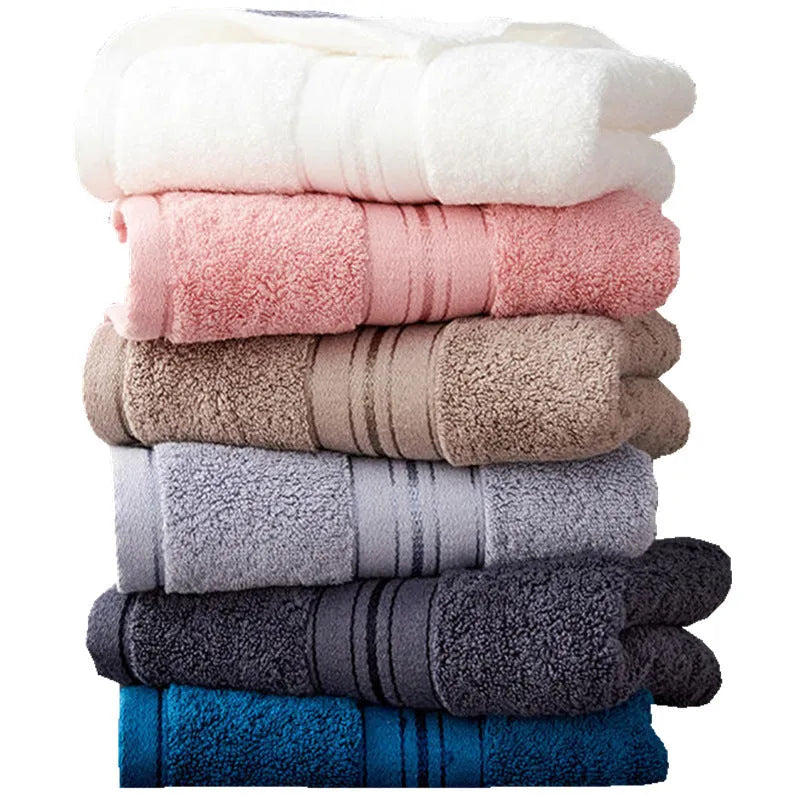 Pure cotton three-piece towel set showing bath towel, hand towel, and square scarf in a blue colour option.