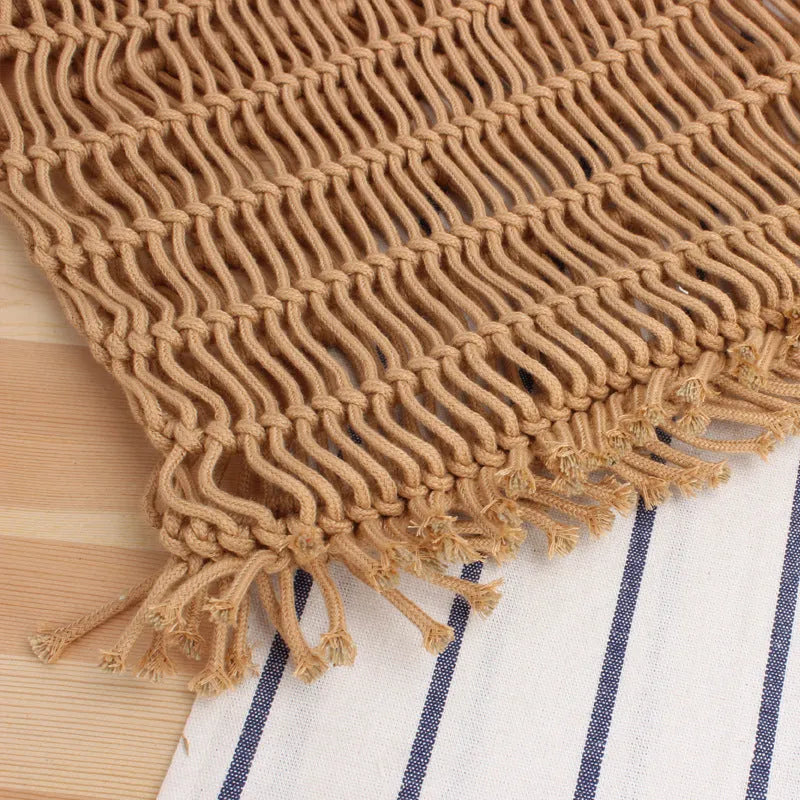 Women's woven straw beach bag with square design and soft handles in natural colour