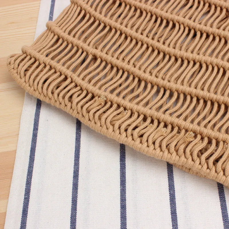 Women's woven straw beach bag with square design and soft handles in natural colour