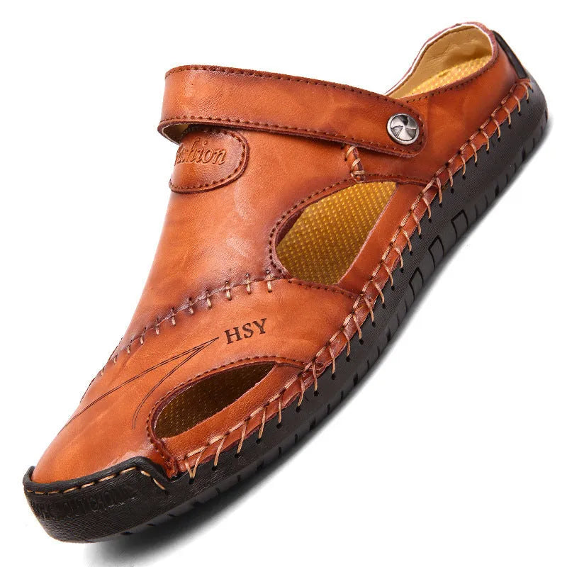 Men's closed toe sandals in black with rubber sole and adjustable slide strap