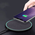 Black car wireless fast charger with aluminium alloy housing measuring 100mm x 60mm