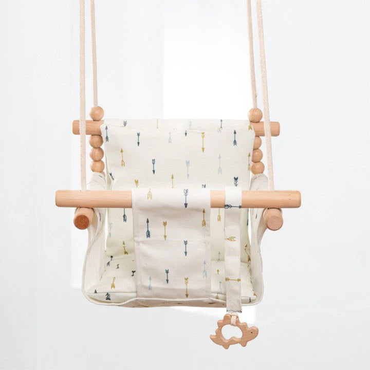 Bohemian style baby swing chair with wooden seat and cotton rope, perfect for indoor and outdoor use.
