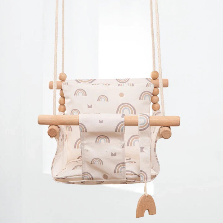 Bohemian style baby swing chair with wooden seat and cotton rope, perfect for indoor and outdoor use.