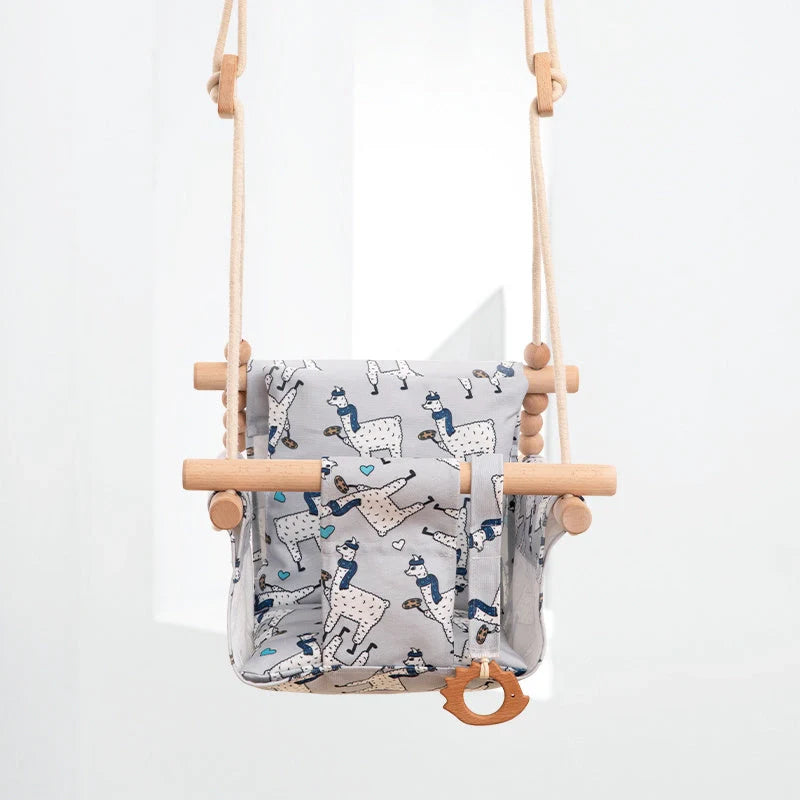 Bohemian style baby swing chair with wooden seat and cotton rope, perfect for indoor and outdoor use.