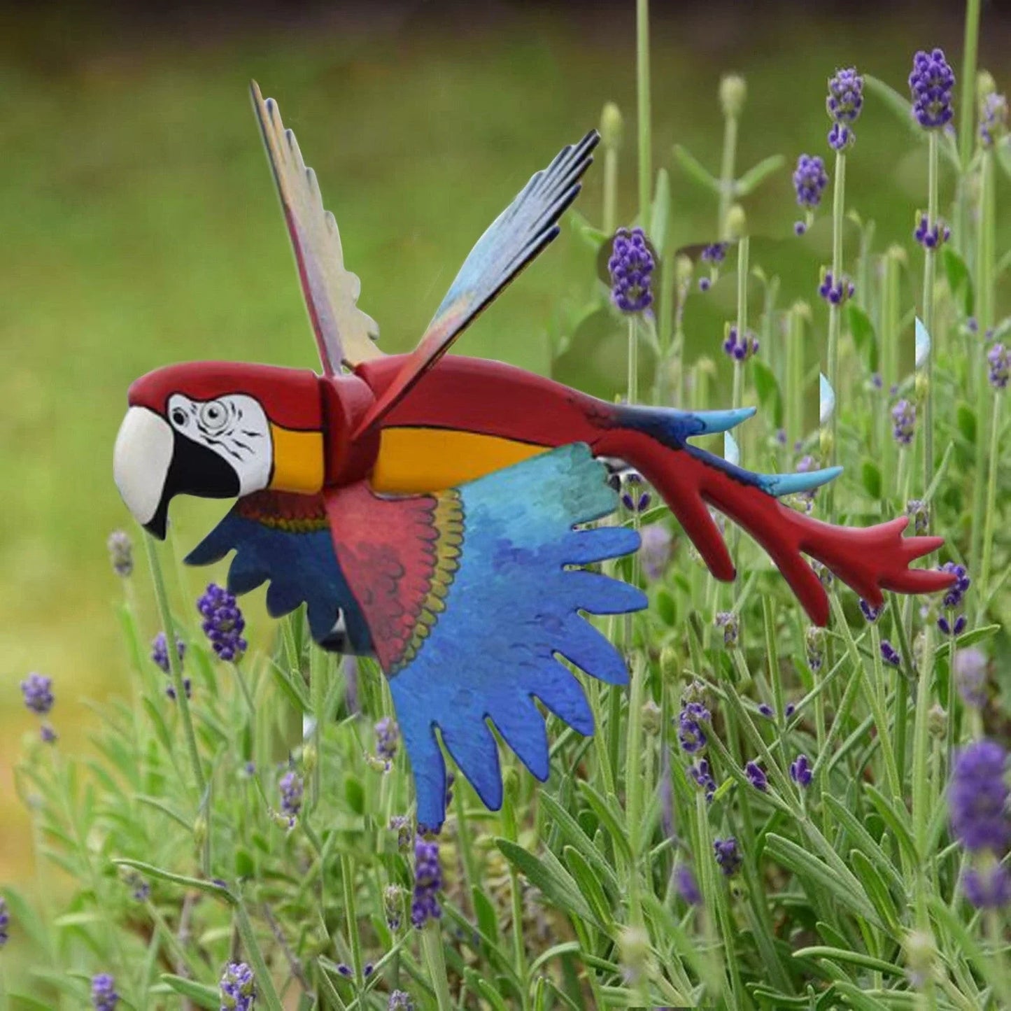 Parrot-themed garden windmill decoration with vibrant colours, spinning in the breeze