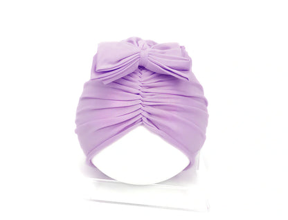 Soft knitted acrylic baby hat in various colours with stretch fit for infants 0-28 months