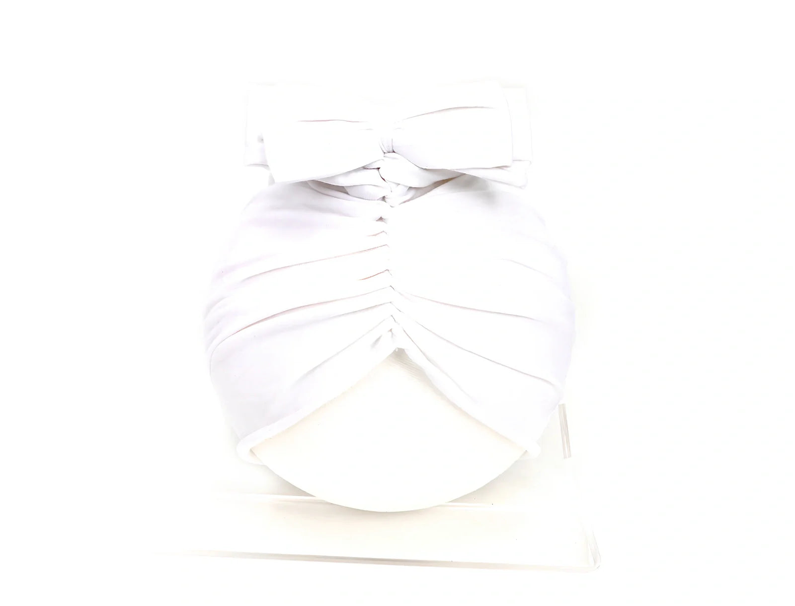 Soft knitted acrylic baby hat in various colours with stretch fit for infants 0-28 months