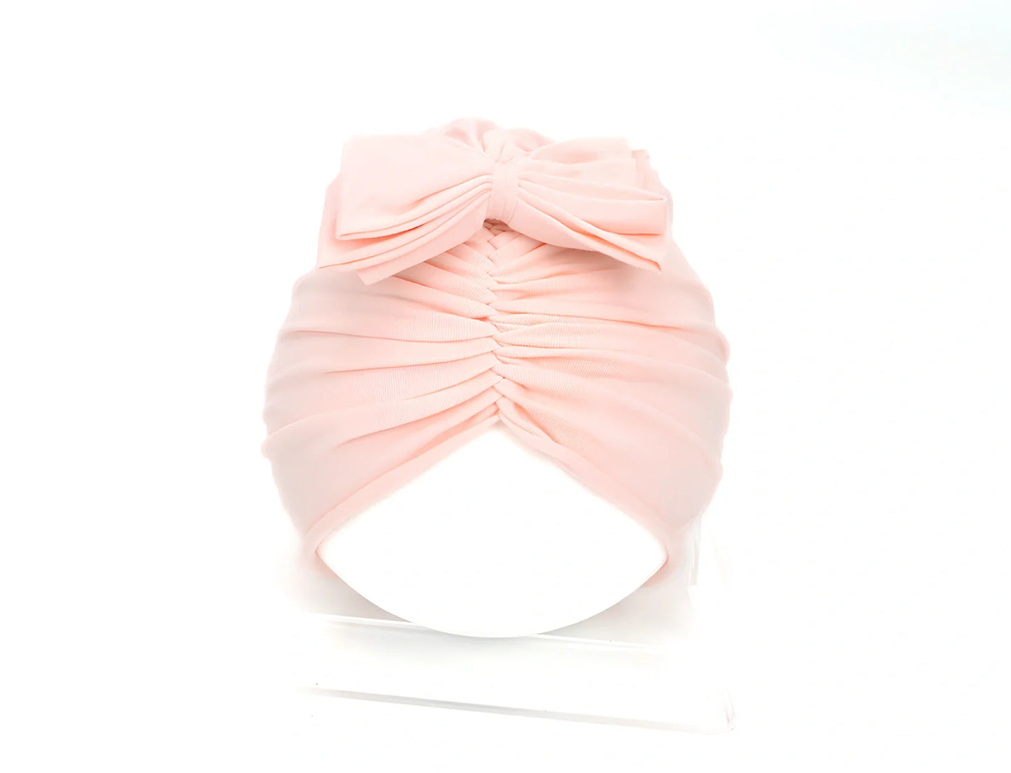Soft knitted acrylic baby hat in various colours with stretch fit for infants 0-28 months