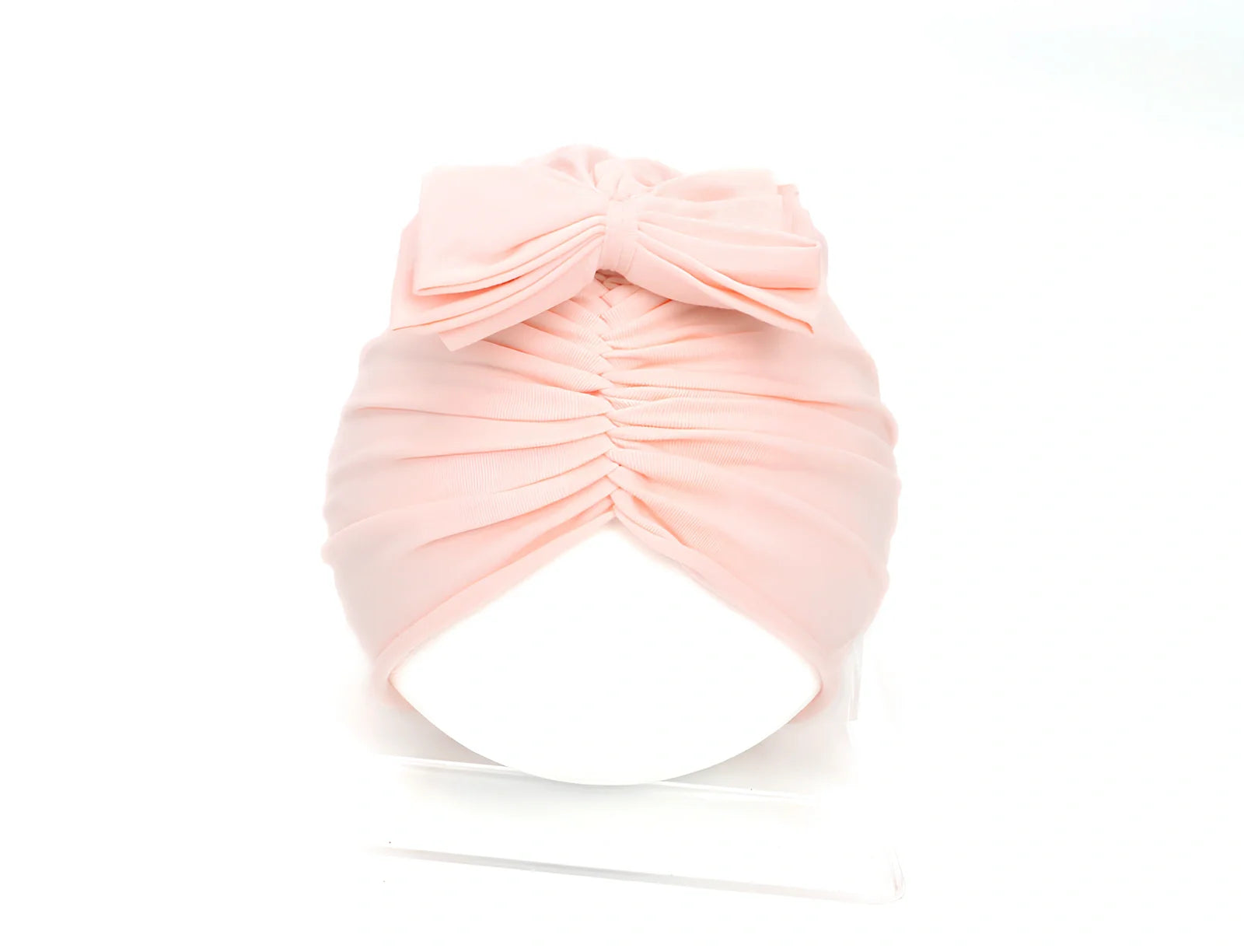 Soft knitted acrylic baby hat in various colours with stretch fit for infants 0-28 months