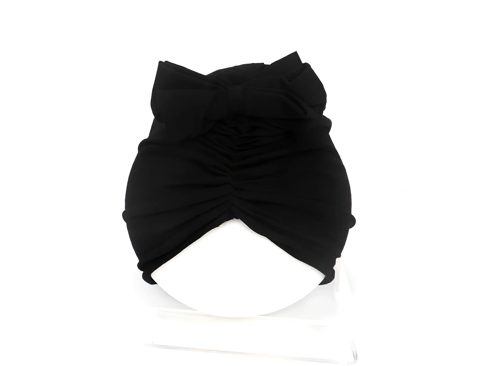 Soft knitted acrylic baby hat in various colours with stretch fit for infants 0-28 months