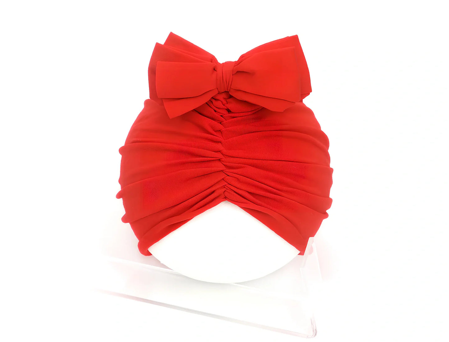 Soft knitted acrylic baby hat in various colours with stretch fit for infants 0-28 months