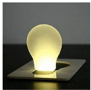 Credit card-sized foldable LED pocket lamp with acrylic shade and inductive switch