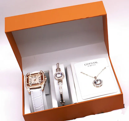 Women's black leather wrist watch set with 32mm dial, necklace, and bracelet on display