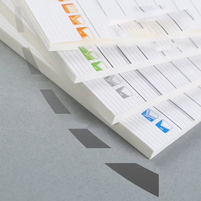 Wholesale bundle of soft cover striped notebooks in Japanese Korean business style, shown with pen options.
