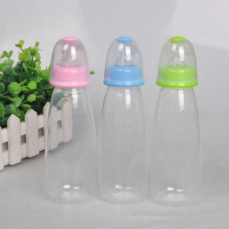 Soft head baby rice cereal squeeze spoon bottle 240mL in blue, green, and pink