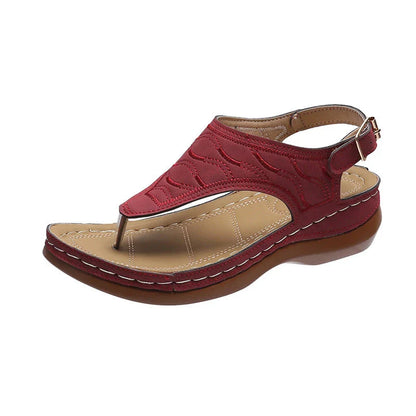 Women's wedge heel flip flop sandals in red with adjustable strap