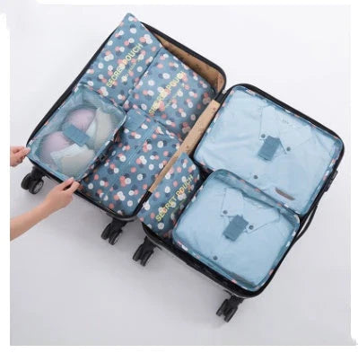 Durable waterproof packing cubes in various colors for organized, efficient travel