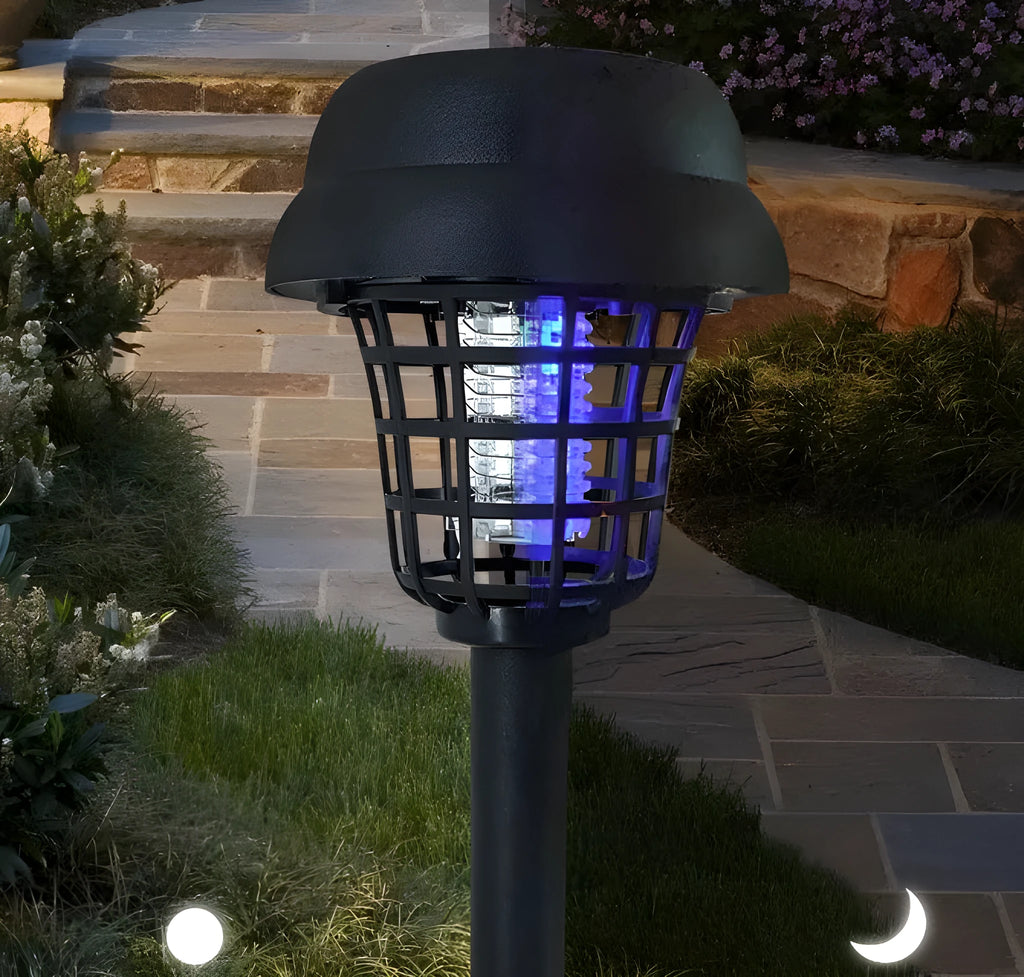 Small white and purple solar-powered mosquito killer lamp for outdoor garden and camping use.