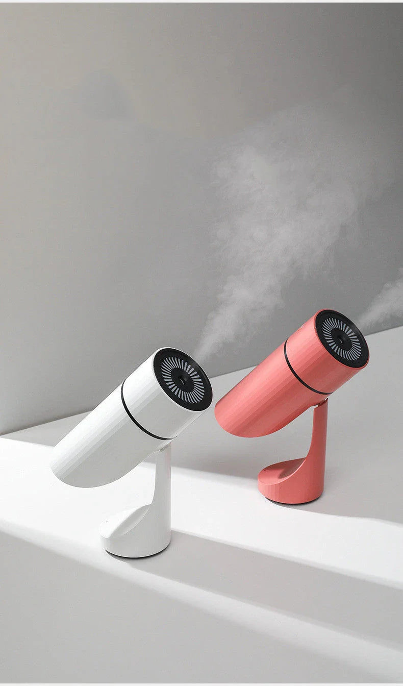 Compact USB charging humidifier with adjustable angle and night light in white, green, and red