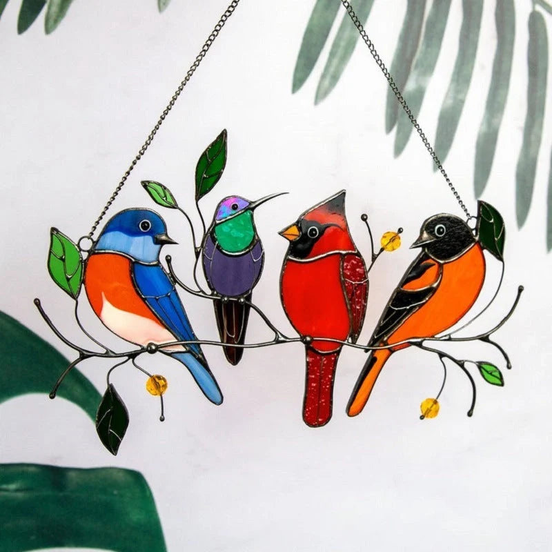 Handcrafted small bird painted window decoration with vibrant colours, perfect for home decor