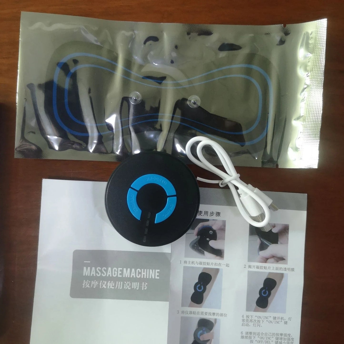 HQ-185 Mini Electric Shoulder and Neck Massager in black with massage patch