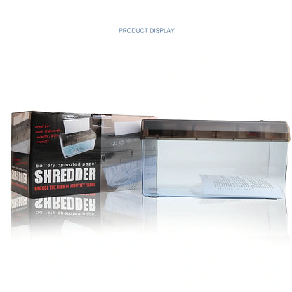 Small electric A4 strip cut paper shredder on desk, 29cm x 15cm x 19cm, shreds 5 sheets into 6mm pieces