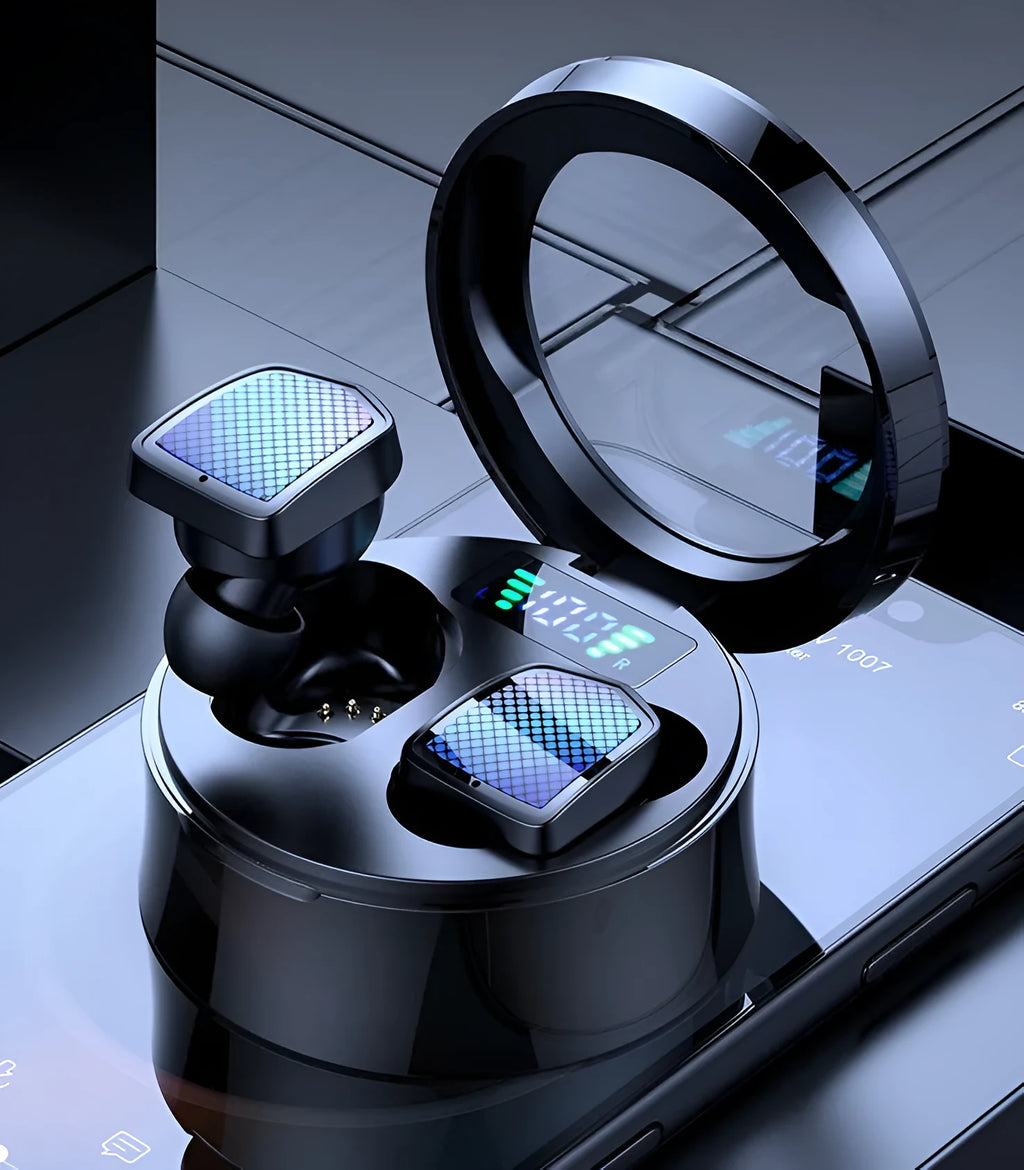 Black and white true wireless Bluetooth earbuds with a compact charging case on a table.