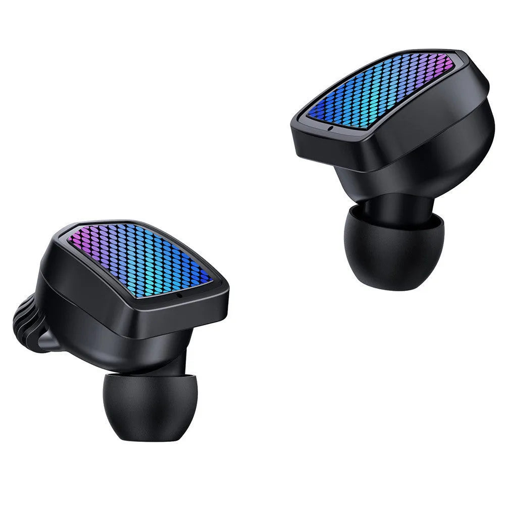 Black and white true wireless Bluetooth earbuds with a compact charging case on a table.