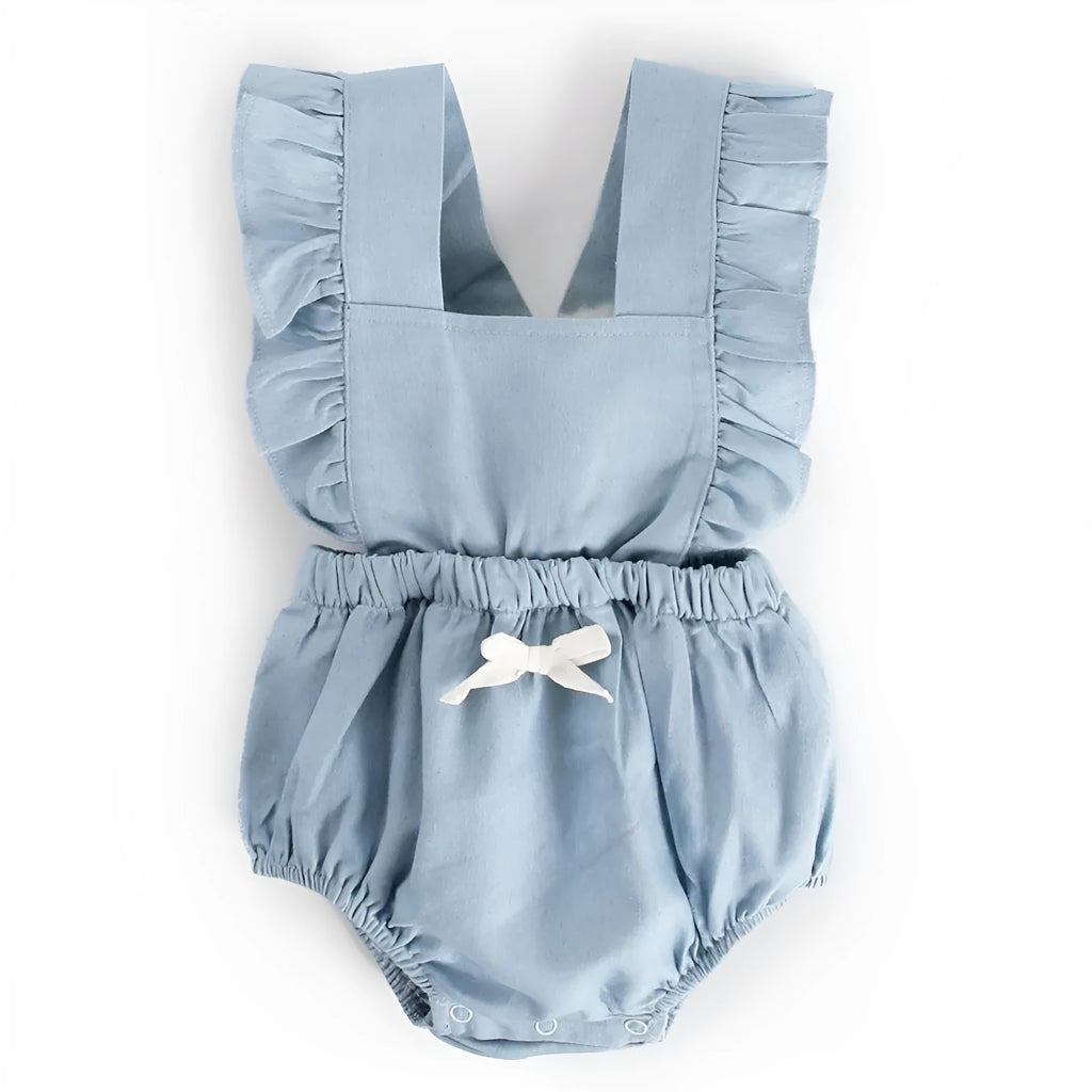 Blue denim lace sleeveless baby romper on a hanger, showing the triangle crawl leg design.