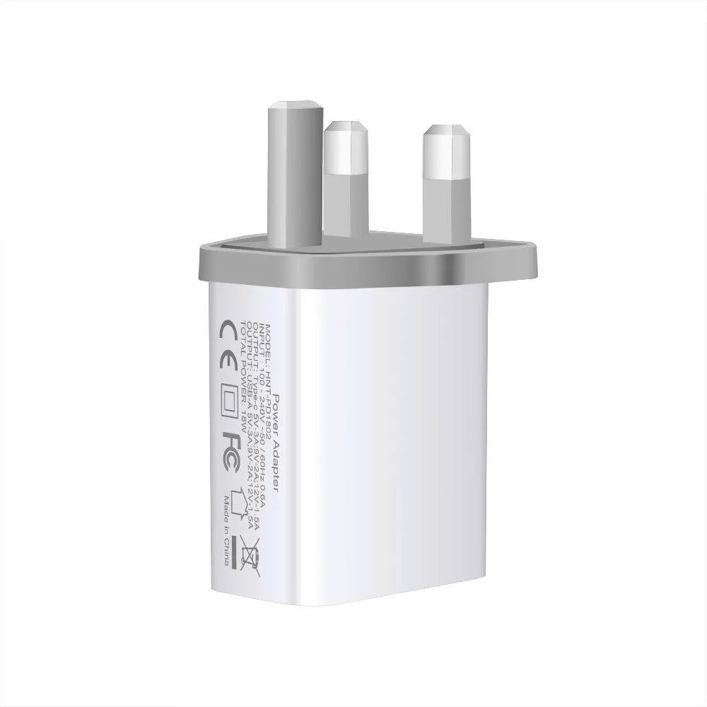 White 18W fast charger with dual USB-C ports and interchangeable EU UK US plugs for iPhone 12