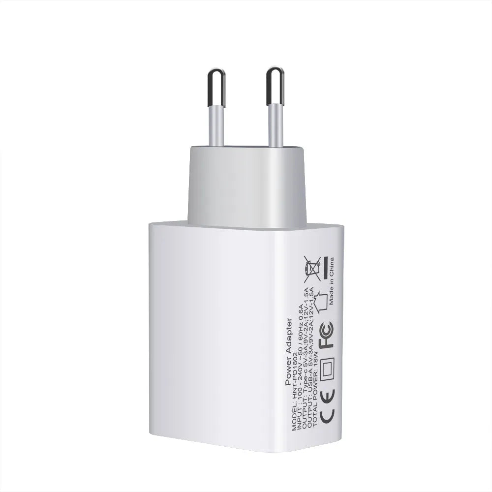 White 18W fast charger with dual USB-C ports and interchangeable EU UK US plugs for iPhone 12