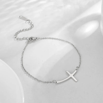 Simple Cross Bend Bracelet in stainless steel with adjustable chain and cross pendant